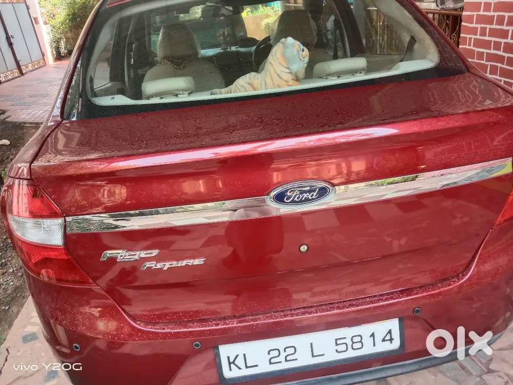 Ruby Red Ford Figo Aspire Petrol Well-maintained