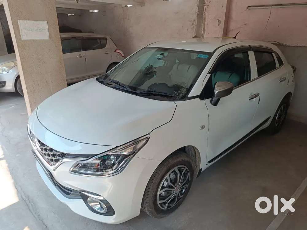 2024 Maruti Suzuki Baleno Sigma &ndash; White &ndash; First Owner