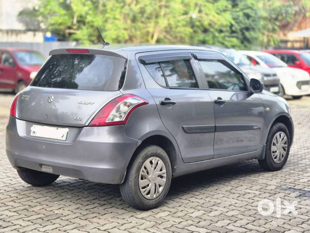 Maruti Suzuki Swift Lxi Optional-o, 2015, Petrol