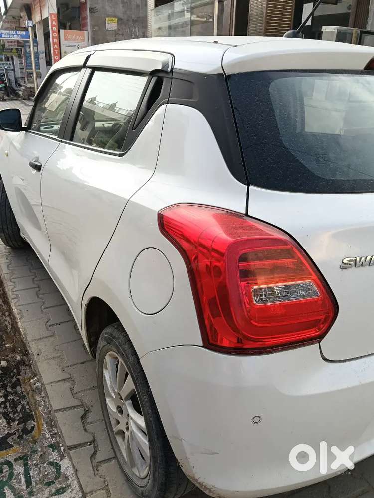 Swift Lxi Maruti 2020 White ,57000km Driven