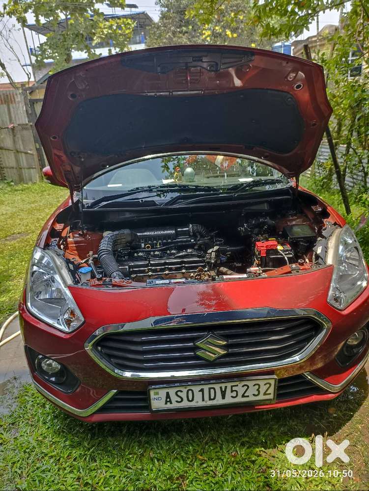 Maruti Suzuki Dzire ( Gallant Red). First Owner