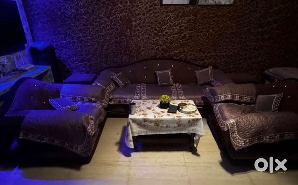 Beautiful, classy designer sofa , rich brown colour