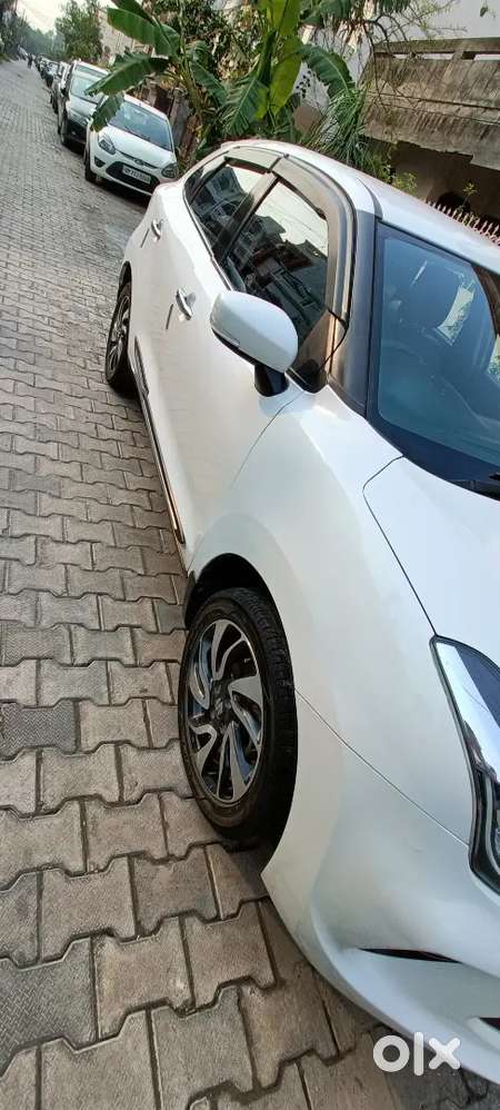 Baleno Zeta White  2019 1 St Owner