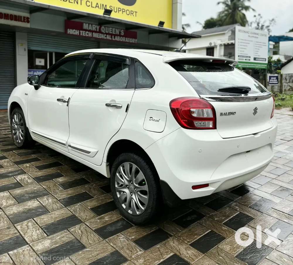 2017 Maruti Suzuki Baleno Alpha Diesel  Pearl White  91,000 Km  Sho