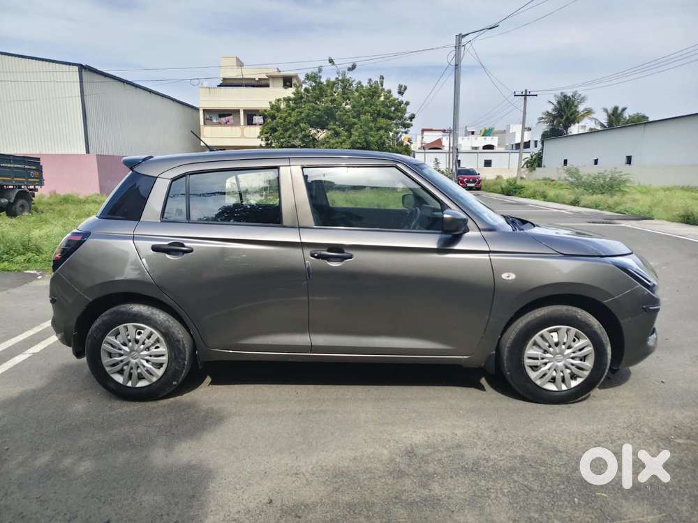 Maruti Suzuki Swift 1.2 Lxi (o), 2024, Petrol