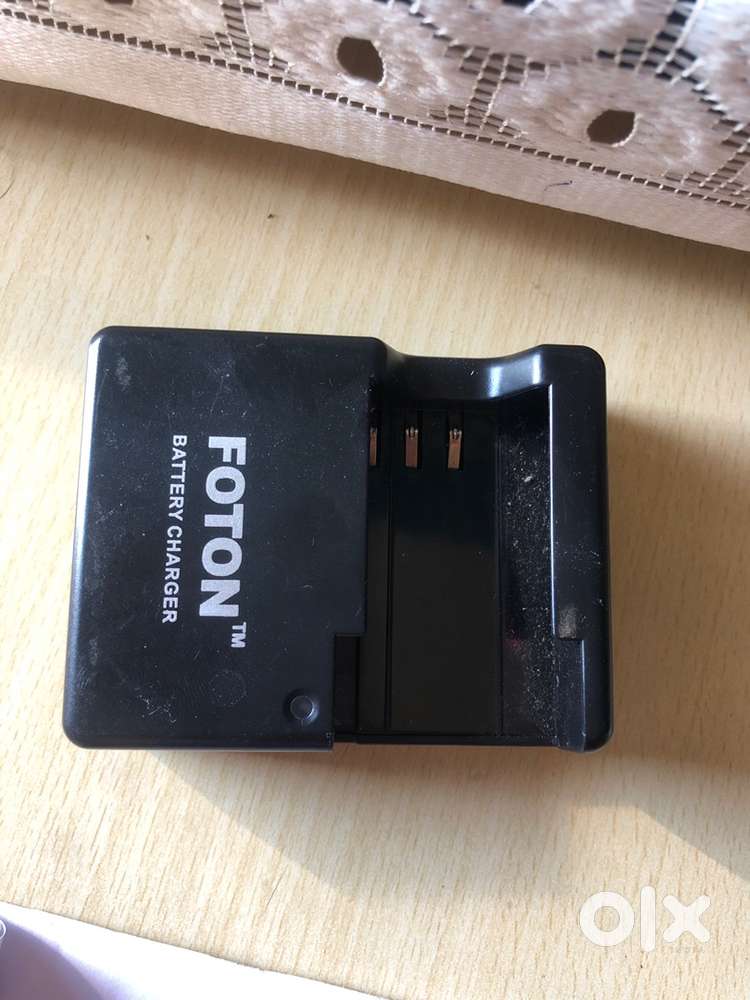 Nikon brand new charger with charging cable also