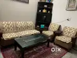 The dining room set along with a computer table.