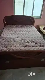 Double sized wooden bed (with mattress)