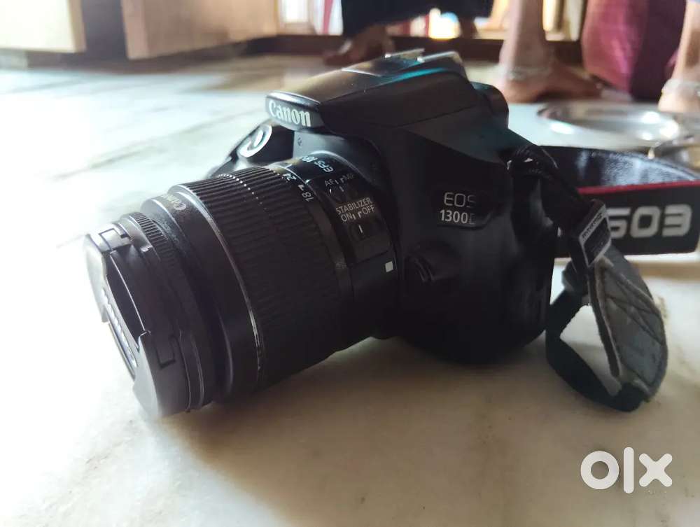 Canon D1300 with 55 mm lens charger battery 4gb memory card also