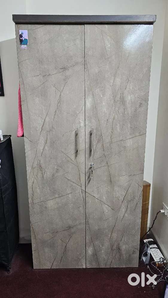 Urgent Double door wardrobe (wooden ply)