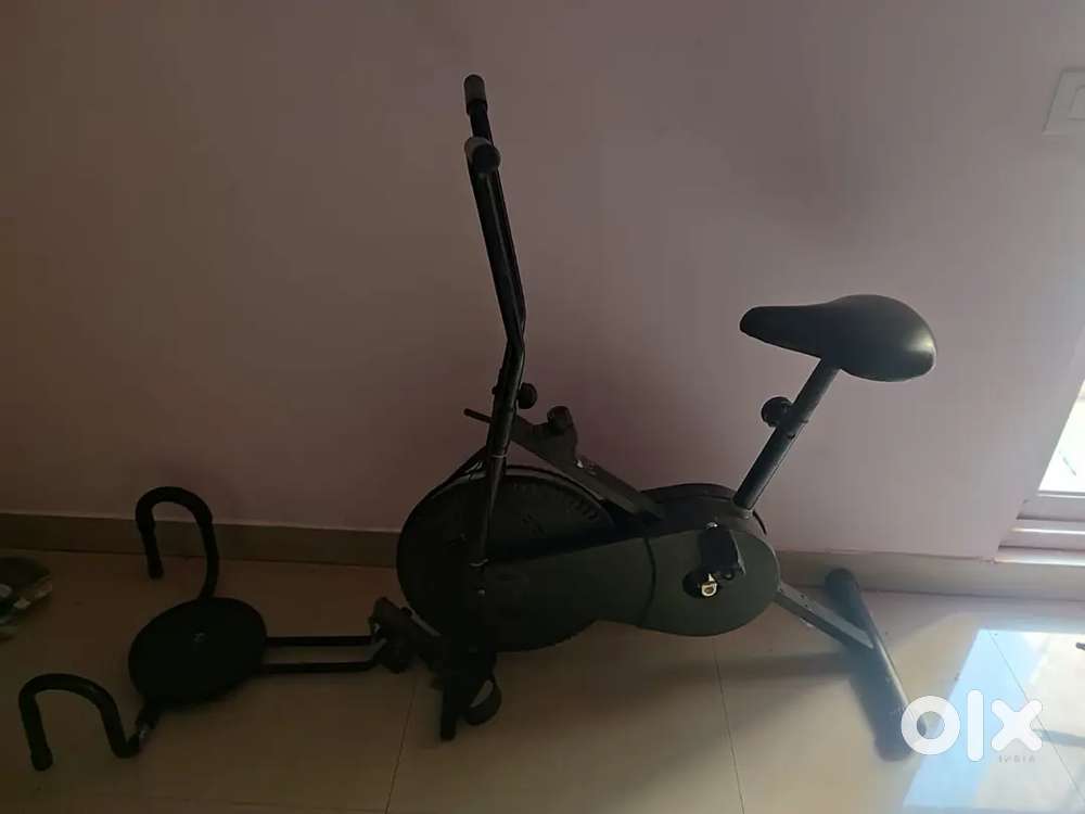 Exercise cycle with tummy roll