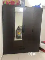 Three Doors (2 Single & 1 Double) wooden wardrobe.