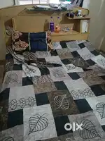 King size bed with mattress and water storage tank