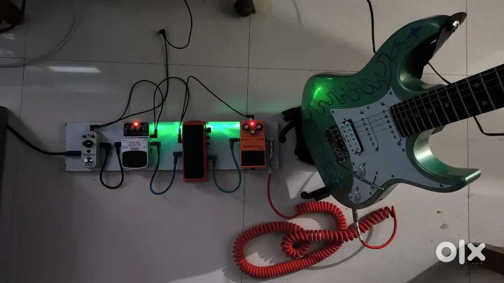 Complete Electric Guitar Setup with Pedals and Amplifier
