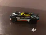 Hot wheels twinduction orange, black base, chrome int., tinted windows