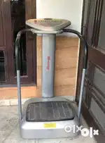 Vibration plate exercise machine