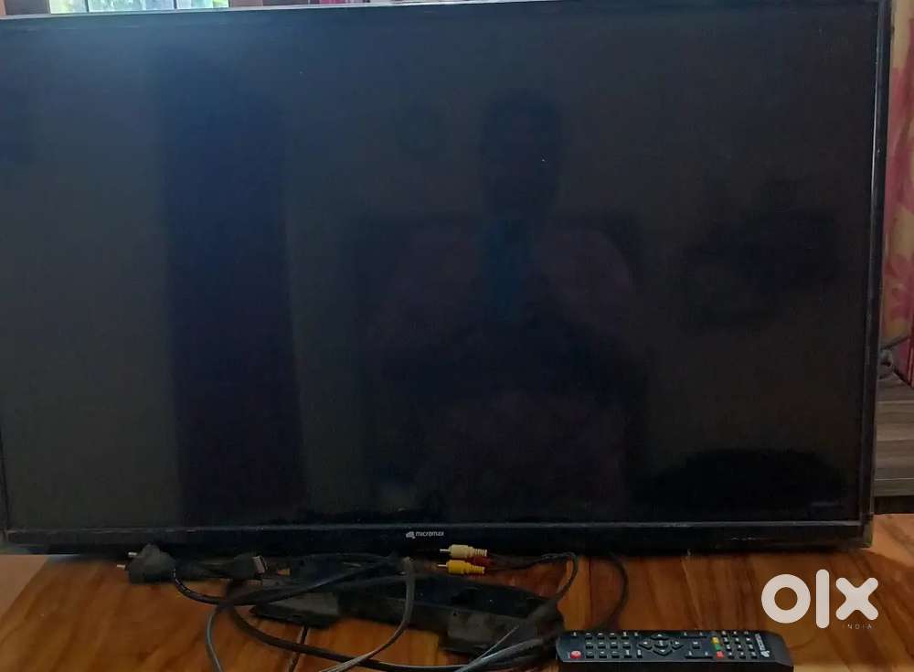 TV, wall stand and remote