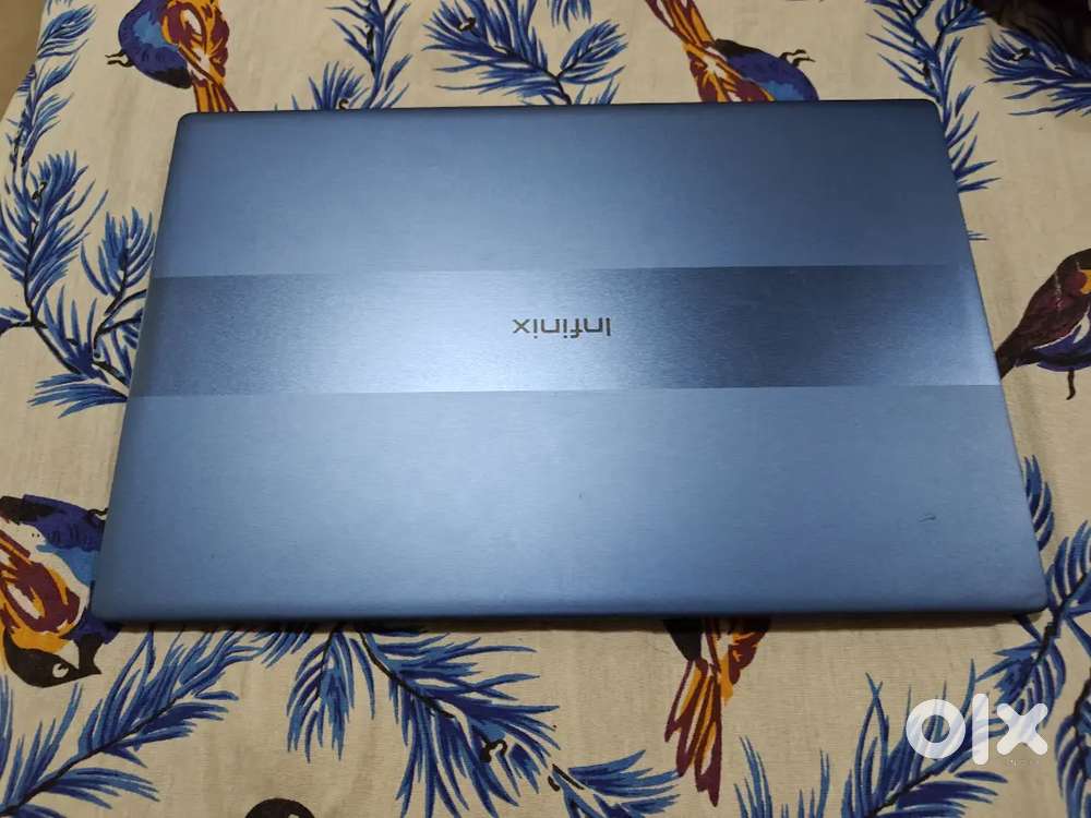 New condition Infinix i3 10 gen laptop with orginal windows 11