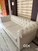 2 Sofas with table in white leather