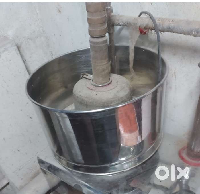 Wet grinder with coconut scrapper