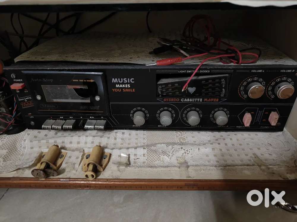 Old cassette player with 12 volt car battery charger