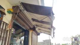 Awning folding shed