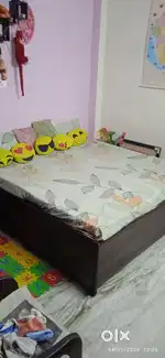 Double bed with storage, settie with storage and two cupboards