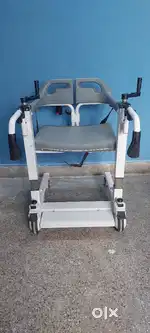 Patient lifter and transfer wheel chair