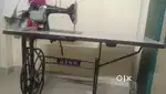 Tailoring machine with motor.