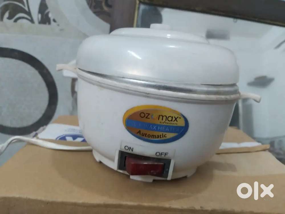 Completely Ok ozomax company wax and oil heater .