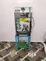 Sugarcane juicer with stand and beeler.