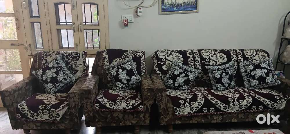 5 seater sofa with 6 seater dining table and a double bed