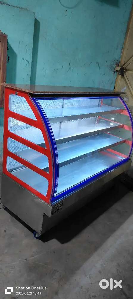 Sweet shop cake pastry display counter showcase 9 month old running