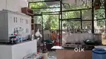 किचेन में काम करने के लिए महिला(सुबह 5 से शाम 5 बजे तक)  चाहिए ।