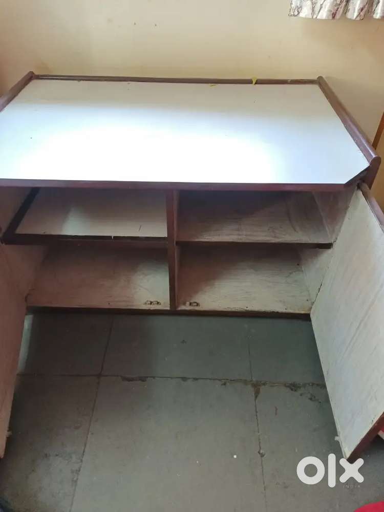 Table with compartment underneath