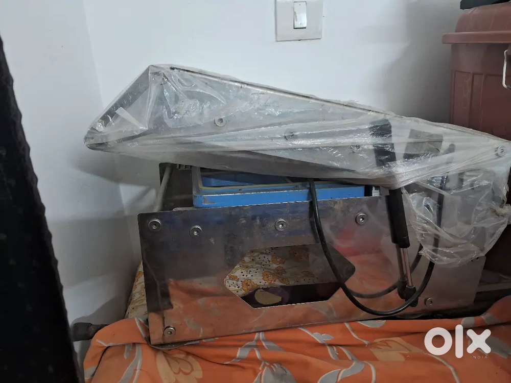 Food thali packing machine (good condition) almost new