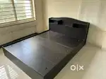 Queen size storage bed available for sale
