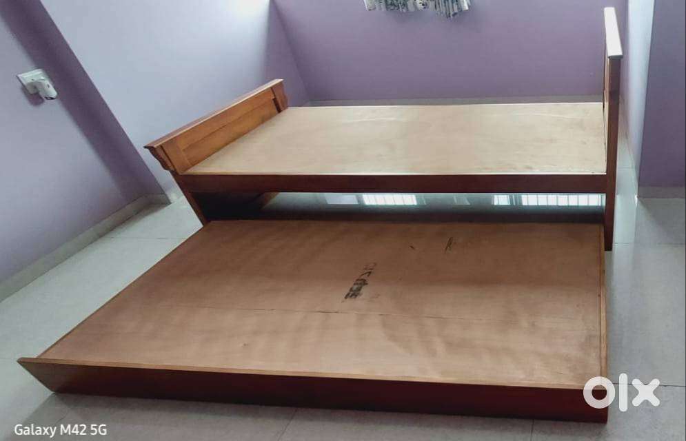 BRAND NEW WOODEN TRUNDLE BED