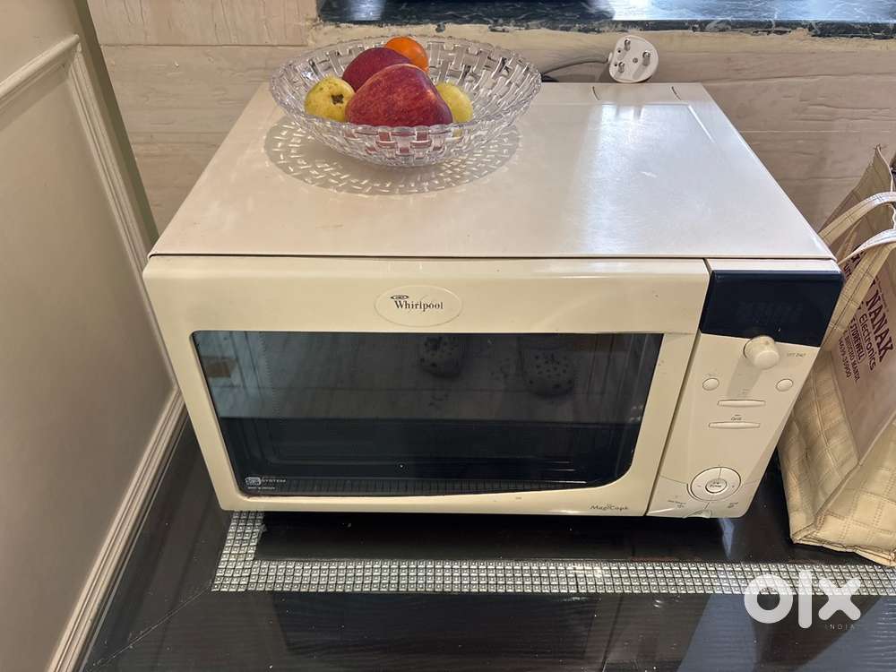 Microwave , white colour , brand - whirlpool ,
