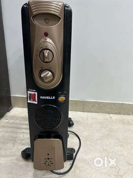 Havells Oil-Filled Radiator Room Heater – Efficient & Cozy Heating!
