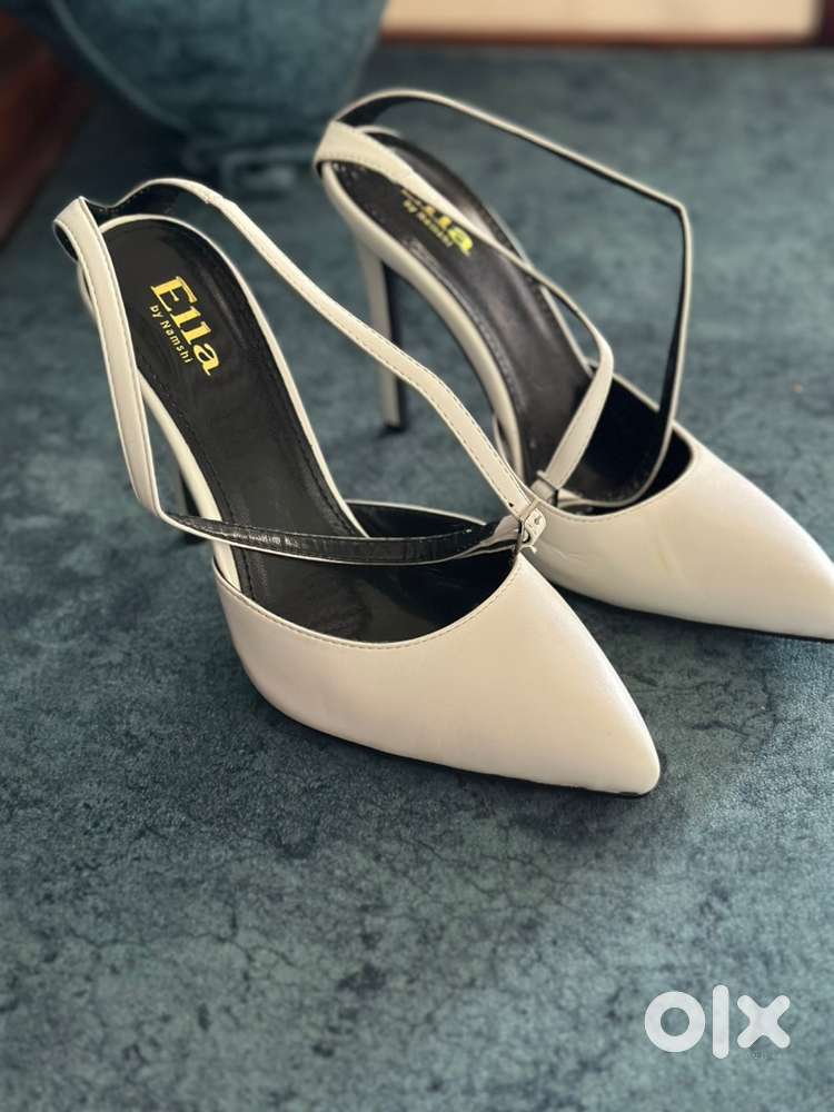 white stiletto heels,new pair,never worn
