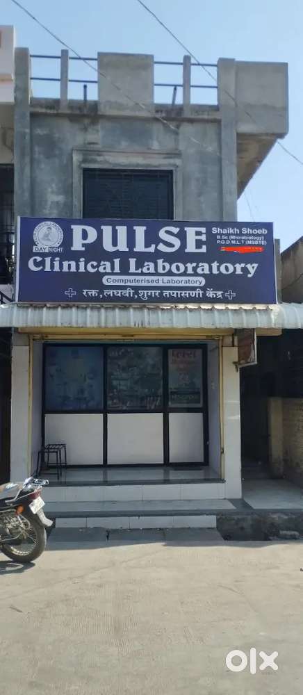 Road touched house with comercial shop