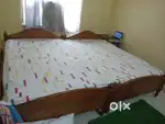 Two double beds with mattress.