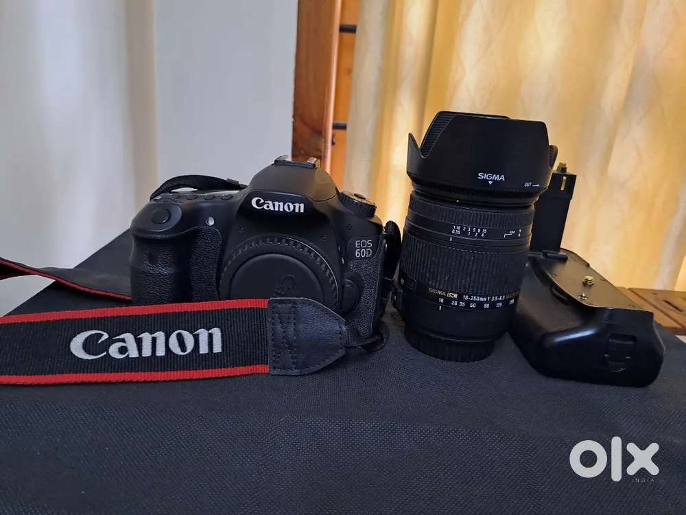 CANON 60D DSLR( BODY)+ SIGMA 18-250mm LENS + BATTERY GRIP( GENERIC)