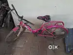 Girls cycle with basket