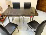 4 Seater dinning table plus 4 cusion chair