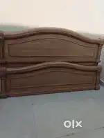 Back n front side of bed in very good condition