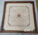 Decathlon Carrom board in good condition with Carrom powder & Coin set