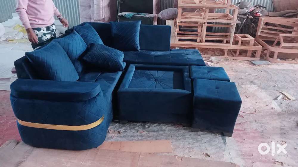 L shape sofa 7 seater 2 puffy 1 table