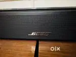 Bose soundbar 900 with bass boost and surrounding speaker